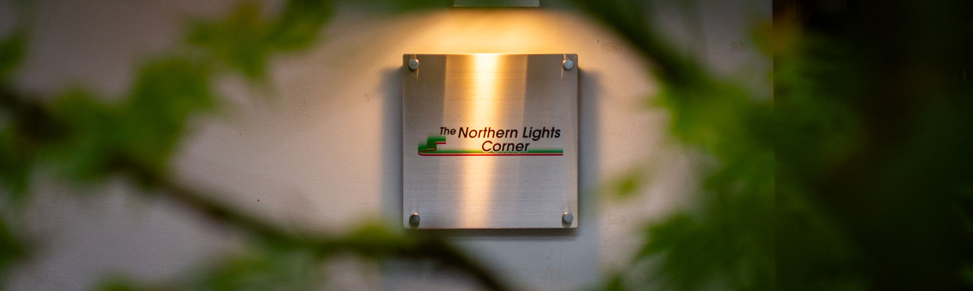 the northern lighs corner sign